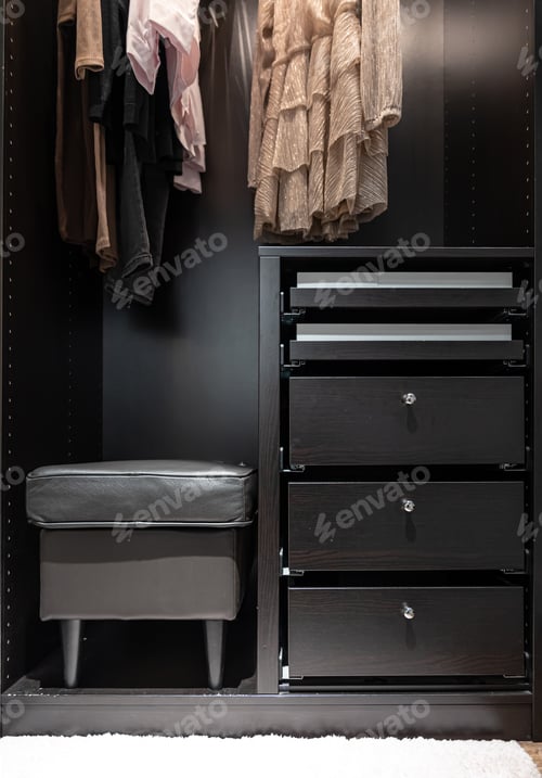 Preview: Black wardrobe, locker and pouf, inside view.