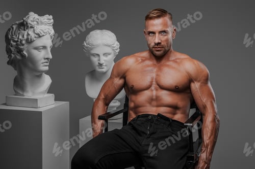 Preview: A sensual, muscular man in black jeans