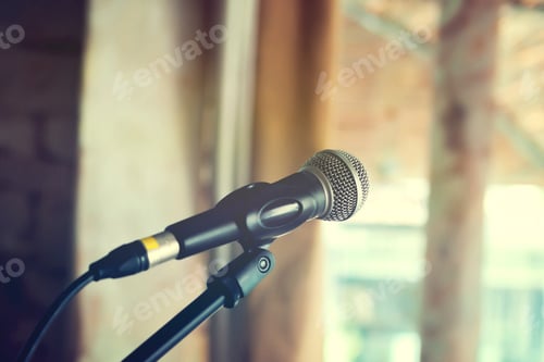 Preview: Black vintage mic on indoor stage -in vintage tone (selective focus)