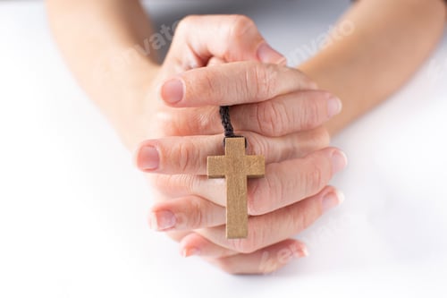 Preview: Woman praying with Rosary catholic cross
