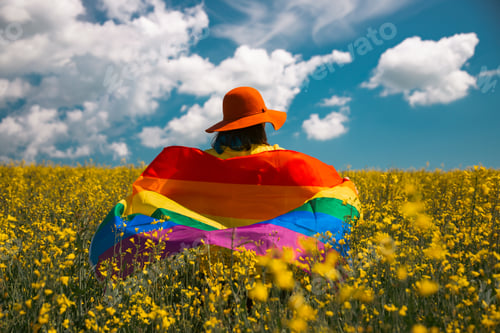 Preview: Young woman with LGBT flag.