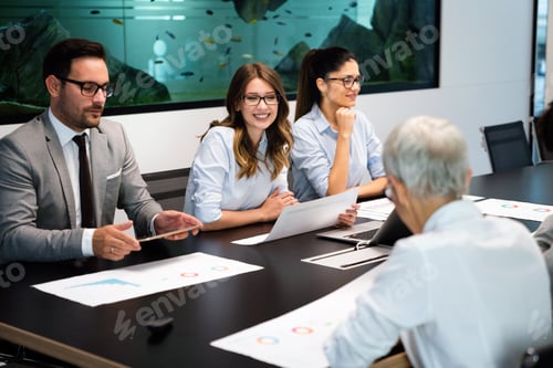 Preview: Happy diverse business colleagues meeting, working in modern office