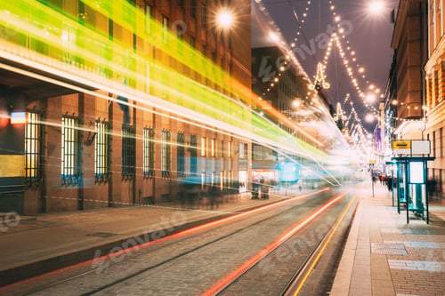 Preview: Helsinki, Finland. Tram Departs In Motion Blur From Stop On Alek