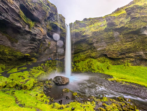 Preview: Iceland's Kvernufoss cascades, long-exposure shot.