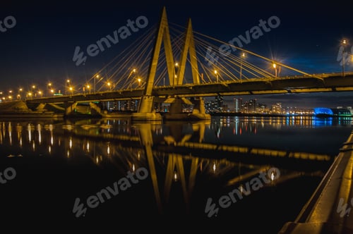Preview: Millennium Bridge in Kazan reflected in the waters of the river Kazanka. Russia.