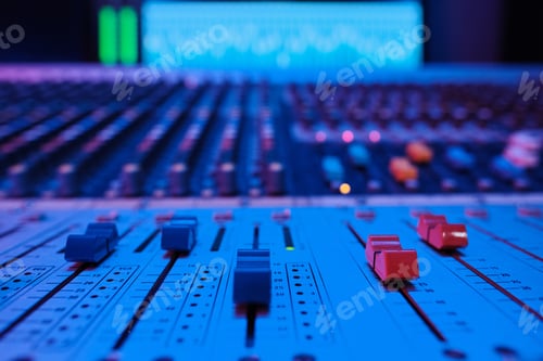 Preview: Close Up of Audio Mixing Board in Blue Light
