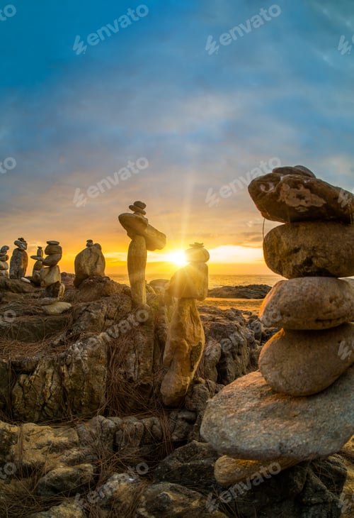 Preview: Stones pyramid on sand symbolizing zen, harmony, balance in Khao Lak Thailand