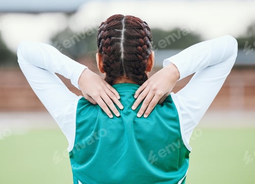Preview: Athlete, field or sports woman with back pain in exercise, body training injury or outdoor workout.