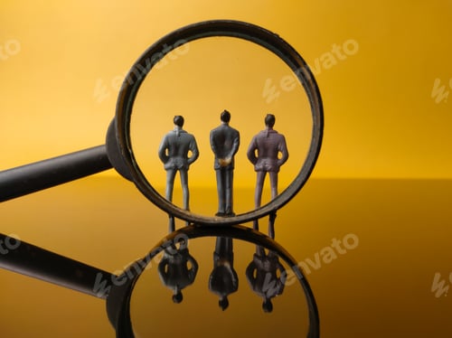 Preview: Miniature people and magnifying glass with reflection on a yellow background