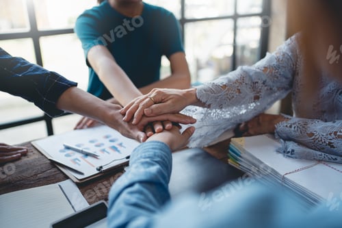 Preview: Young entrepreneurs work as a team meeting and work together on a new project that emphasizes unity