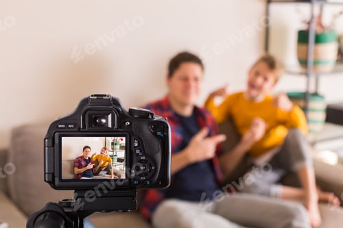 Preview: Father and Child Posing in the Camera Display