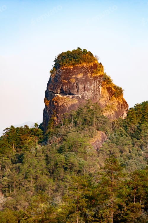 Preview: Beautiful Danxia landform. A beautiful and unique stone mountain and green plants in Wuyi Mountain