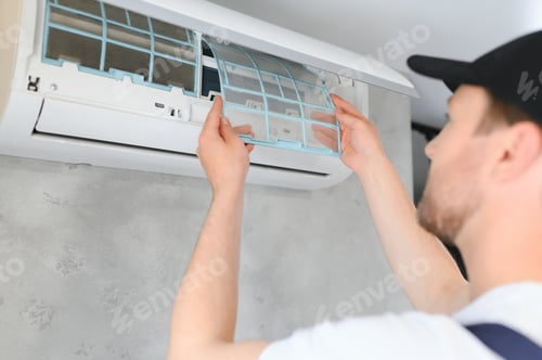 Preview: Service man is cleaning, repair and maintenance of air conditioner.