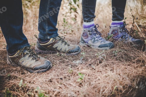 Preview: Close-up of young hikers feet.