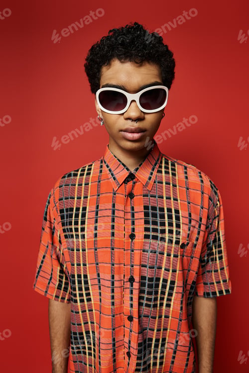 Preview: Stylish Young Man in Plaid Shades
