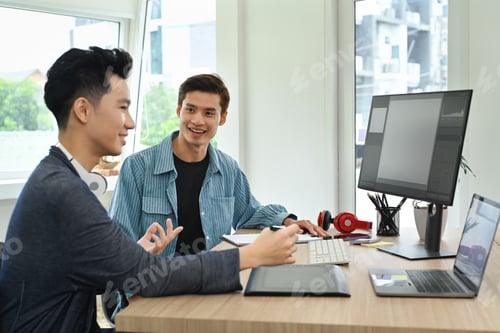 Preview: Team of content creator working together, editing video footage with professional computer.