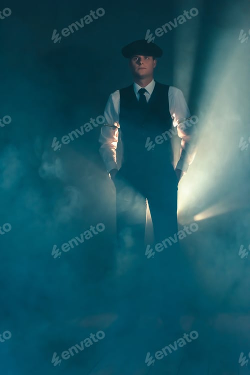 Preview: Retro Businessman With Cap Standing In Smoky Room.