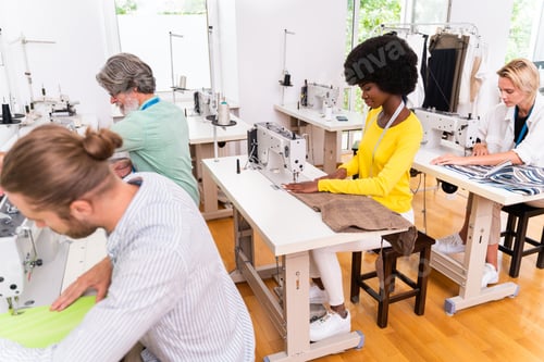 Preview: Team of fashion designers at work