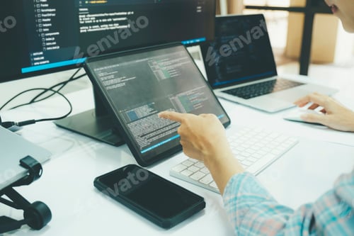 Preview: Programmer is coding and programming software.