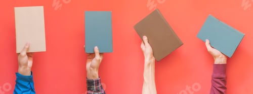 Preview: many hands hold multiple books isolated on color surface concept f
