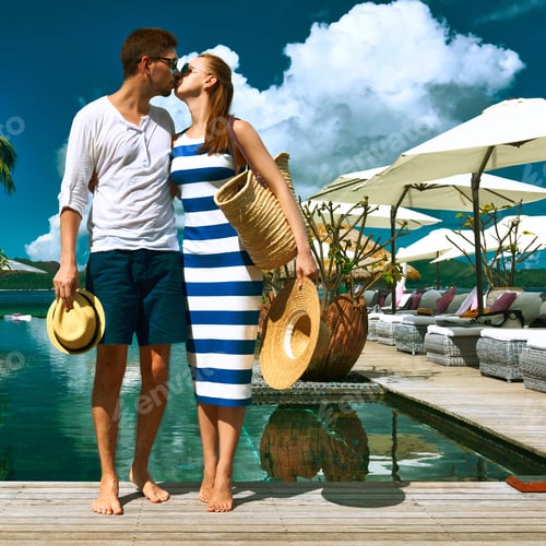 Preview: Couple Kissing Near Poolside Jetty At Seychelles
