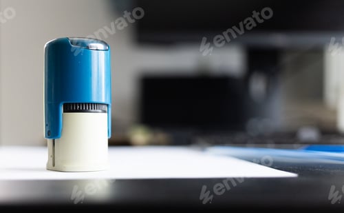 Preview: blue stamp on a white paper
