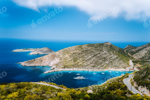 Preview: Beautiful blue sea bay of mediterranean sea in Porto Vromi under white clouds, Zakynthos island