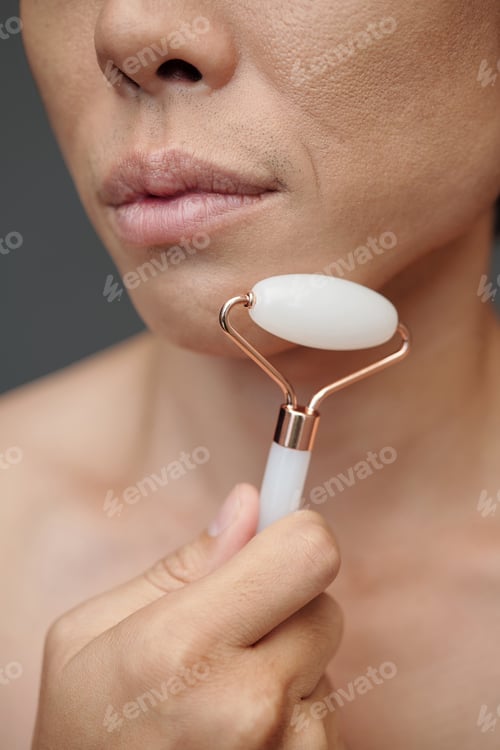 Preview: Man Massaging Nasolabial Folds