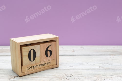 Preview: September 6. Image of September 6 wooden calendar on wooden background . Autumn day
