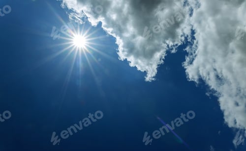 Preview: Bright sun on blue dramatic sky with clouds and sun