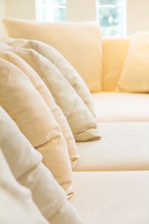 Preview: Close up of cushion on sofa background