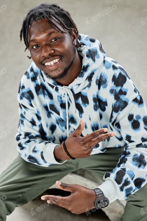 Preview: Vertical portrait of young black man wearing hoodie