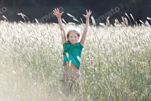 Preview: Girl on the field of ripe grain