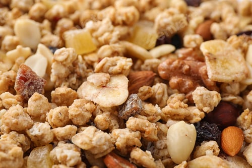Preview: Healthy crunchy granola as background, closeup view