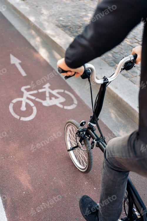 Preview: Man Using Bike in the Street