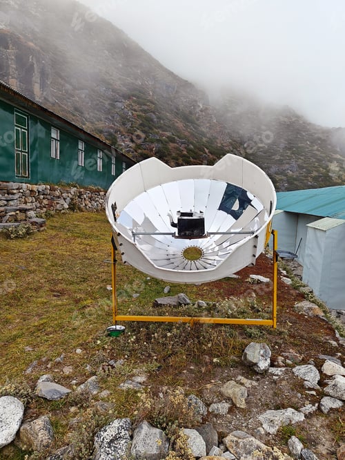 Preview: Warming the teapot in a solar cooker. Nepal. Himalaya