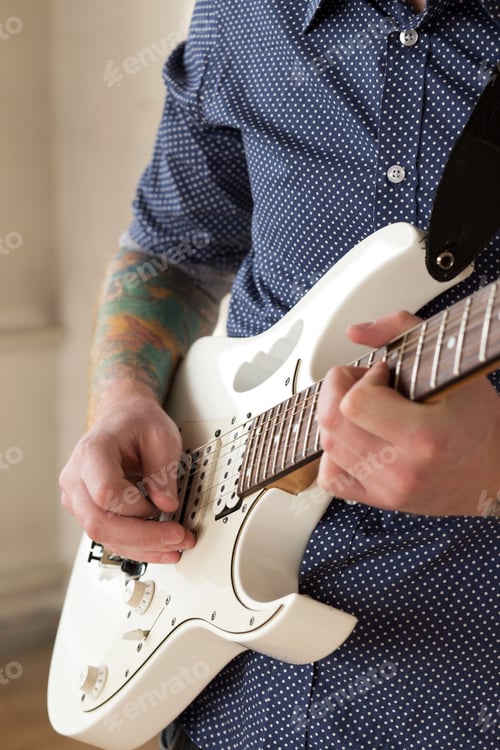 Preview: Man with guitar