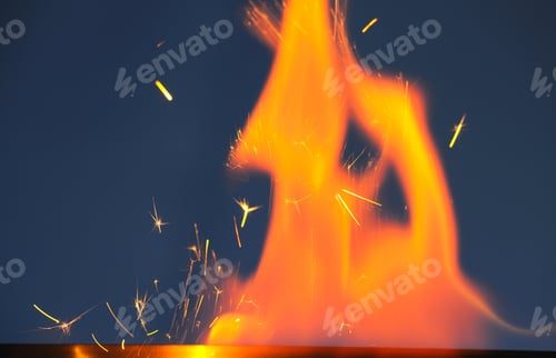 Preview: Close-up flames of an alcohol burner on a dark background