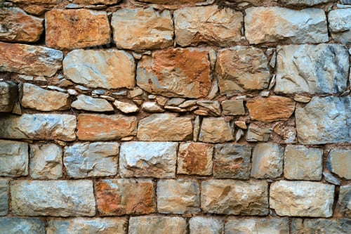 Preview: Background And Texture Of A Bumpy Stone Surface Of A Fragment Of An Old Wall