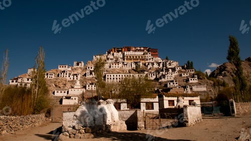 Preview: Buddhist stupa and Buddhist monastery in mountains of Ladakh, India.