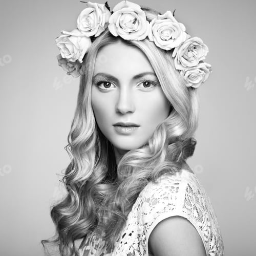 Preview: Portrait of a beautiful blonde woman with flowers in her hair