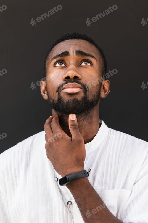 Preview: Black man in trendy clothes in city
