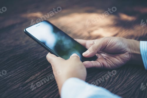 Preview: hand holding smart phone and play something