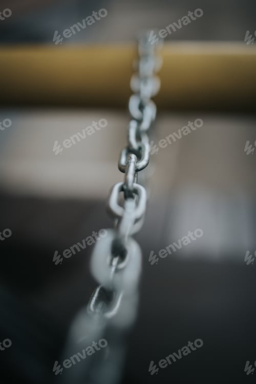 Preview: View of a metal chain on the blurry background