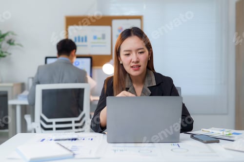 Preview: Business Professionals Collaborating in Modern Office Setting