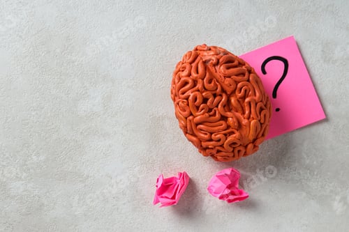 Preview: Decorative brain and pink paper on light background, space for text