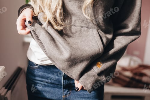 Preview: woman wearing hoodie / style / grey color / denim jeans