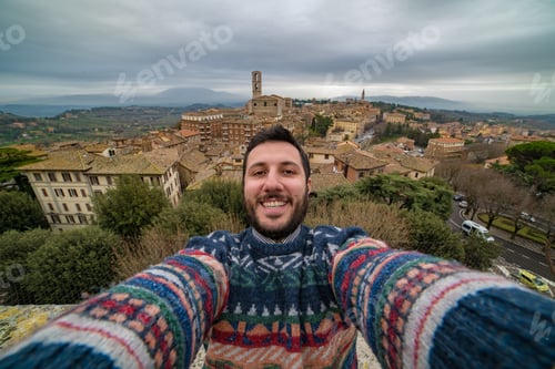 Preview: Handsome Man Take Selfie Photo In Perugia With A View Of The Old Town And The Basilica Di San