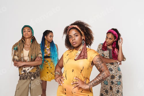 Preview: Young black four women wearing dress posing together on camera