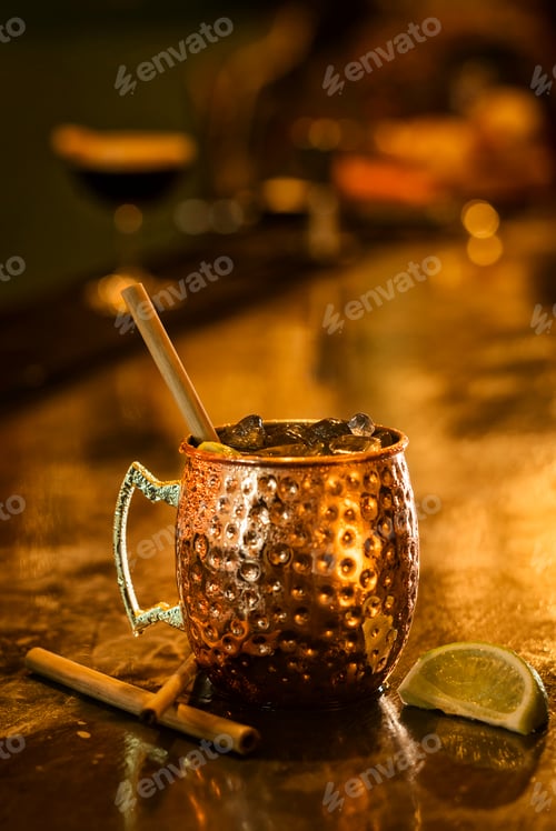Preview: spicy rum cinnamon lime cocktail drink in bar